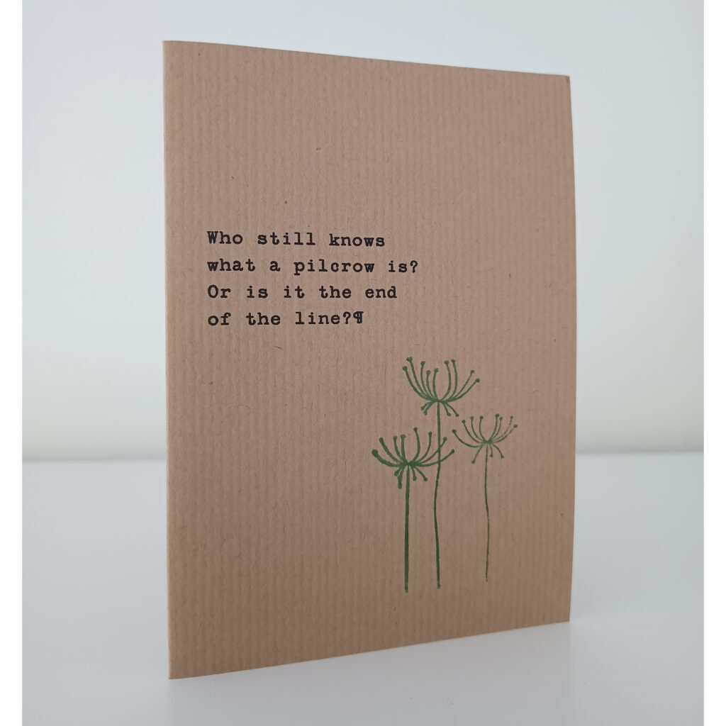 Card with saying: Who still knows what a pilcrow is? Or is it the end of the line?